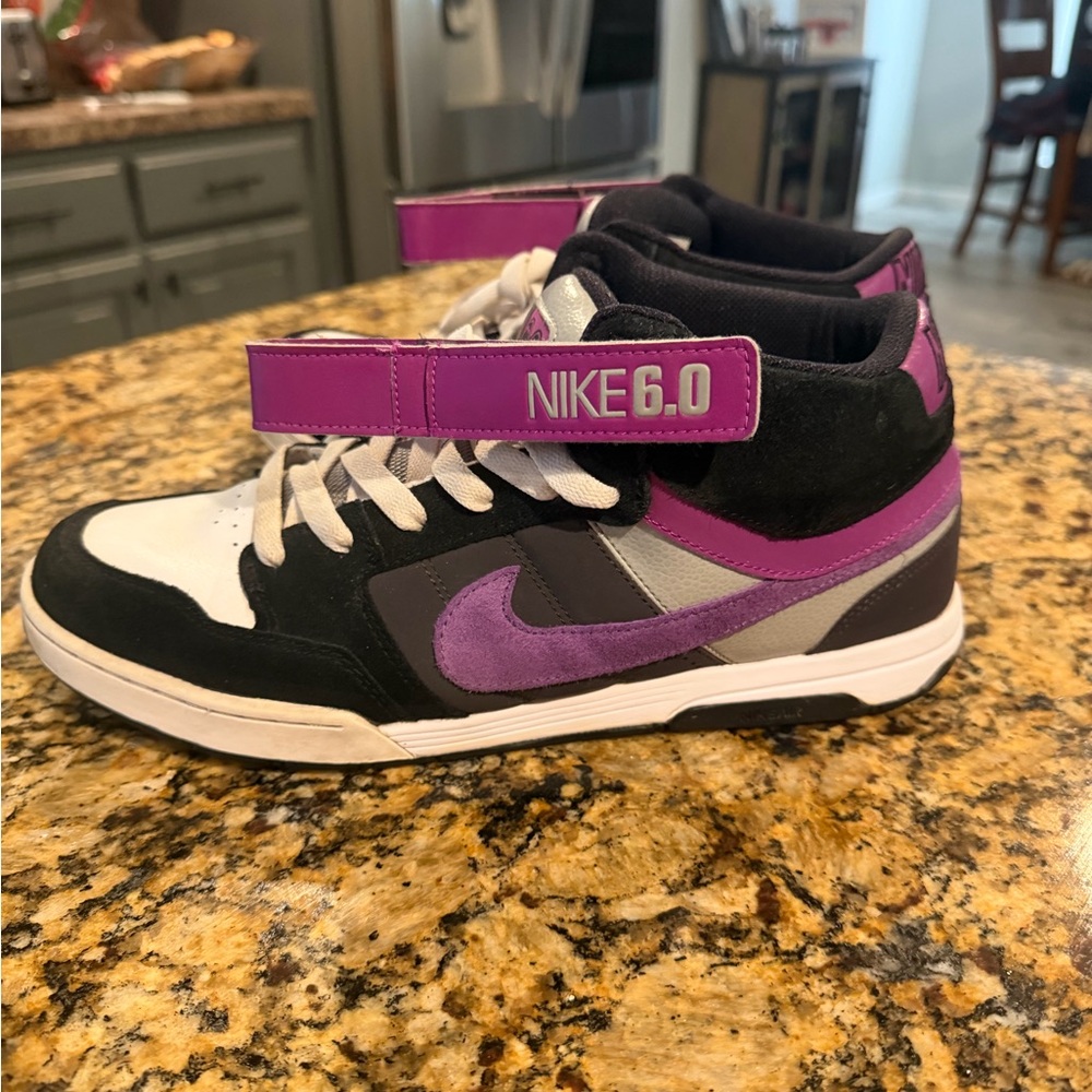 Nike 6.0 Men's Mid-Top Sneakers in Black and purple suede.